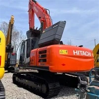 Come sostituire i cingoli sull'escavatore idraulico Komatsu PC200?